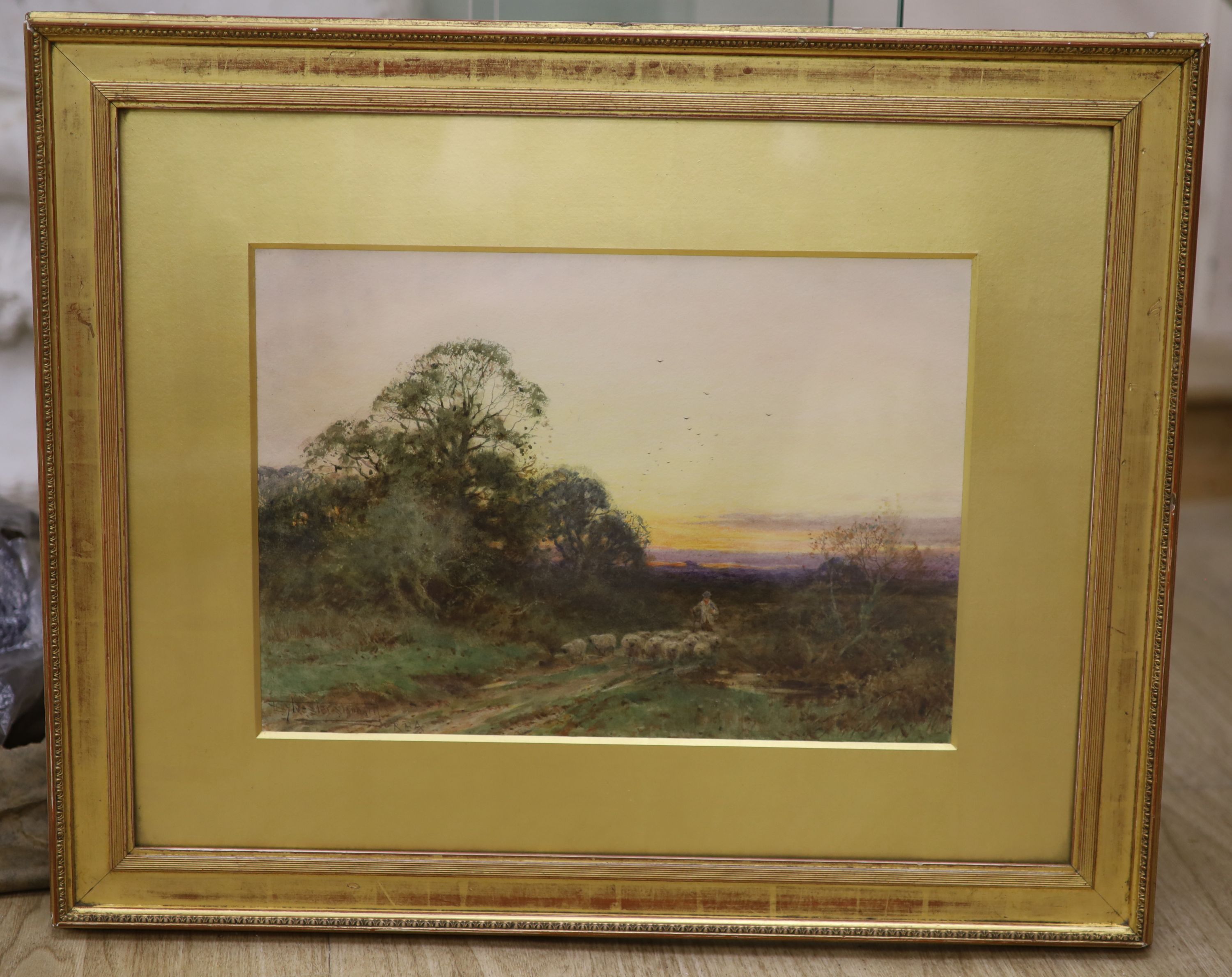 Henry Sylvester Stannard (1870-1951), watercolour, Shepherd and flock at sunset, signed, 24 x 35cm